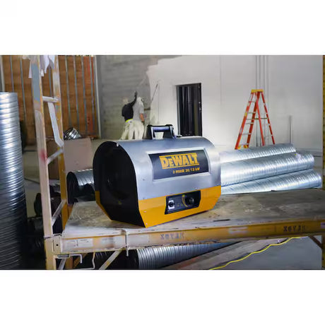 DeWalt air mover on a construction site with rolls of duct tape and a ladder in the background.