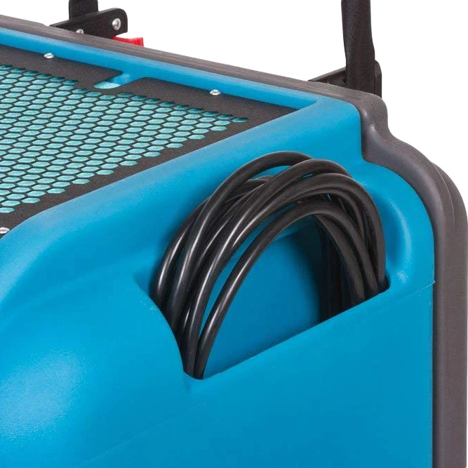 Blue and gray industrial dehumidifier with coiled black cable on a white background