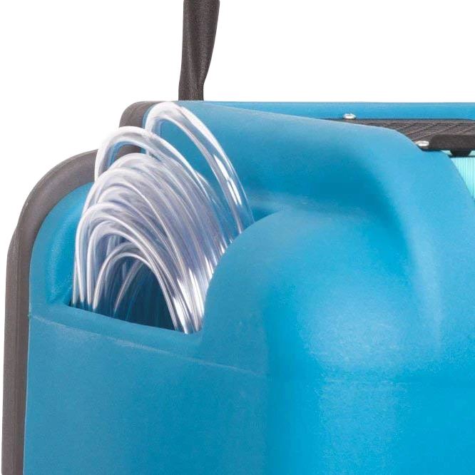 Blue industrial dehumidifier with clear tube on a white background