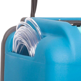 Blue industrial dehumidifier with clear tube on a white background