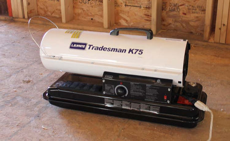 Heater Forced Air Kerosene 75K LB on a wooden floor