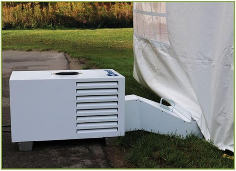 Outdoor Tent Heater LP 40K BTU LB unit on a patio with grass and a tent in the background